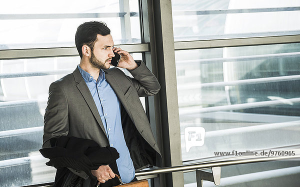 Young businessman on cell phone