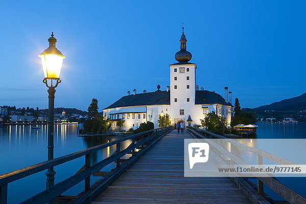 Picturesque Schloss Ort illuminated at dusk  Lake Traunsee  Gmunden  Salzkammergut  Upper Austria  Austria  Europe