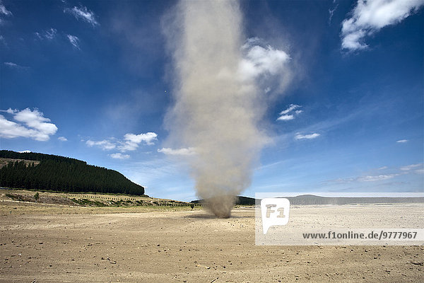 Dust whirlwind twister during summer drought on farm  Waikato  North Island  New Zealand  Pacific