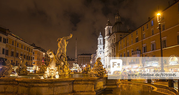 Neptune fountain  Calderoni dountain  Fontana del Nettuno  Piazza Navona with church of Sant Agnese in Agone and Roman Obilisk  at night  Rome  Lazio  Italy  Europe
