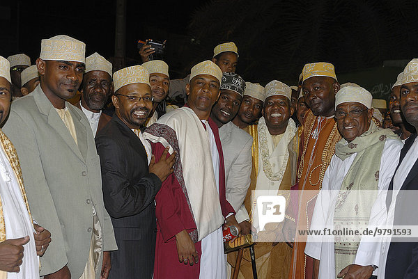 Friendly Comoran men at a traditional wedding of a rich man  Moroni  Grande Comore  Comoros  Africa