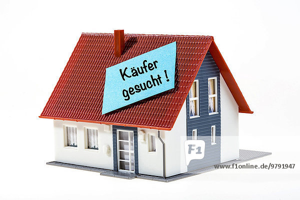 Real estate symbol  looking for buyers  German language