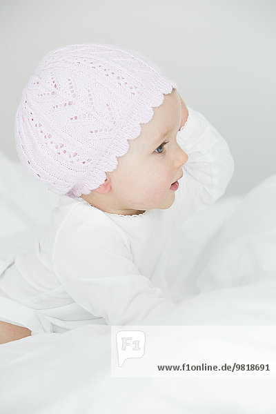 Baby Mädchen mit Mütze
