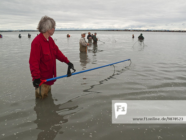 Crowd Of People Dip Net On The Kenai River During Summer  Kenai Peninsula  Southcentral Alaska