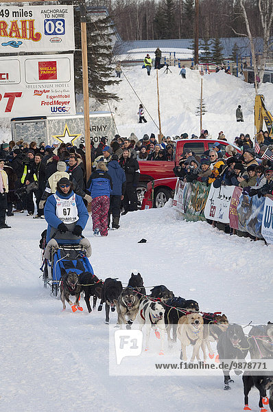 John Baker Leaving The Restart Of The 2008 Iditarod Sled Dog Race  Willow Alaska
