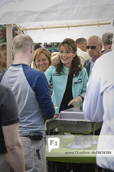 Alaska Governor Sarah Palin Hands Out Hotdogs At The Governor's Picnic In Fairbanks Before Her Resignation As Governor July 26  2009