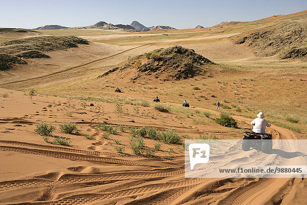 'Quad biking in the Koakoland Desert; Namibia'