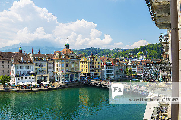 'Buildings and bridge crossing River Reuss; Lucerne  Switzerland'