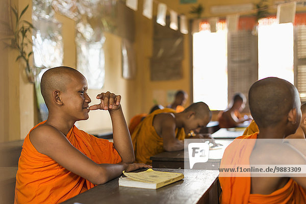 'Young monks attending their class in a small temple near to Sihanoukville city; Sihanoukville  Cambodia'