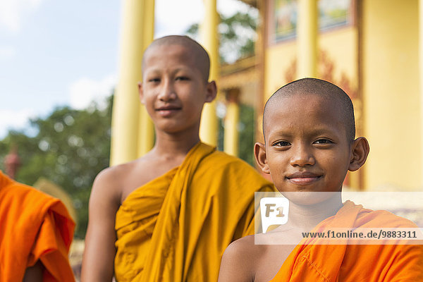 'Young monks outside a small temple near Sihanoukville City; Sihanoukville  Cambodia'