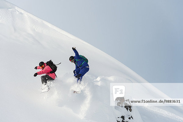 Snowboarding Pulverschnee Gesichtspuder Kanton Graubünden Schnee
