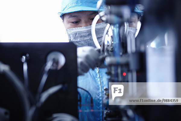 Worker at e-cigarettes battery factory  Guangdong  China