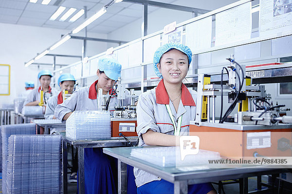 Workers at e-cigarettes battery factory  Guangdong  China