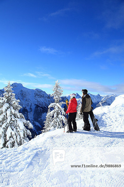 Female skier and snowboarder  Tegelberg  Ammergau Alps  Allgaeu  Bavaria  Germany  Europe
