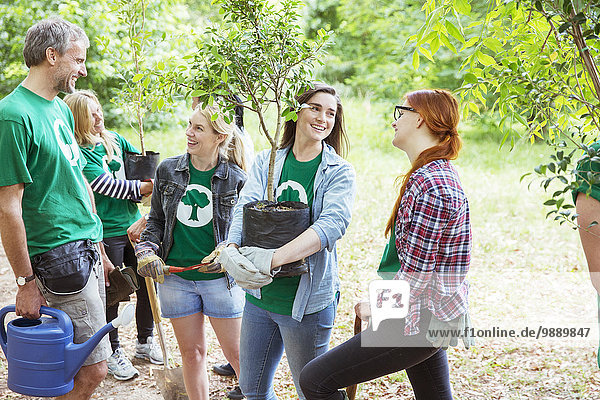 Environmentalist volunteers planting new trees