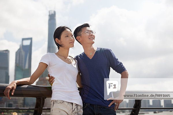 Tourist couple looking up  The Bund  Shanghai  China