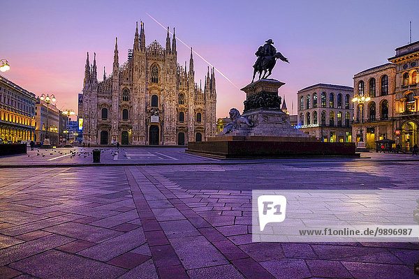 Italy  Milan  Cathedral with equestrian statue Vittorio Emanuele II in the morning