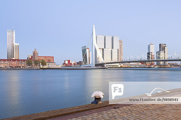 Netherlands  County of Holland  Rotterdam  Kop van Zuid  View to Erasmus bridge and the skyline in the evening