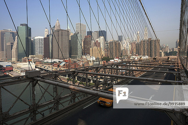 View from Brooklyn Bridge towards the skyline of Lower Manhattan  New York  USA