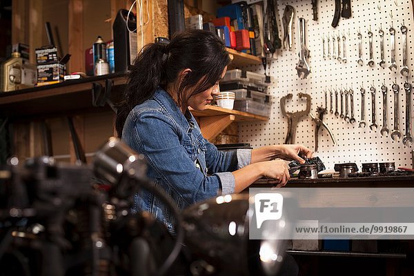 Female mechanic in workshop