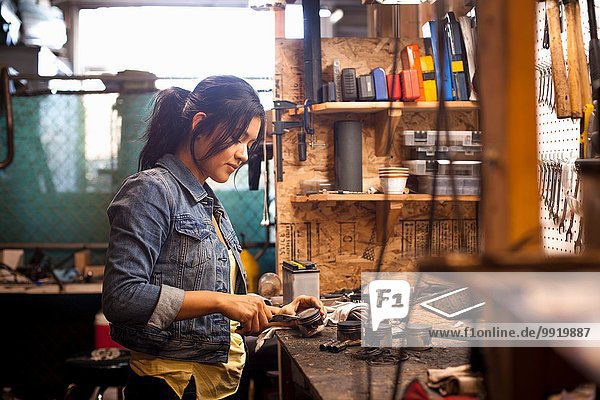Female mechanic in workshop