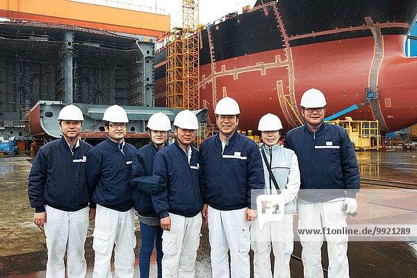 Portrait of workers at shipyard  GoSeong-gun  South Korea
