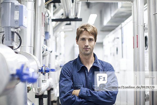 Skilled worker in industrial plant  portrait