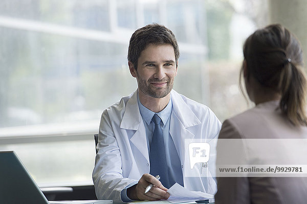 Doctor meeting with patient