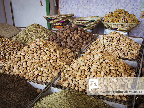 Bins of nuts and grains for sale in market
