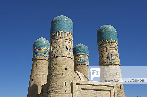 Außenaufnahme Sehenswürdigkeit bauen Tag Gebäude niemand Architektur Religion Islam UNESCO-Welterbe Asien Buchara Zentralasien Koranschule Minarett Moschee Seidenstraße Usbekistan