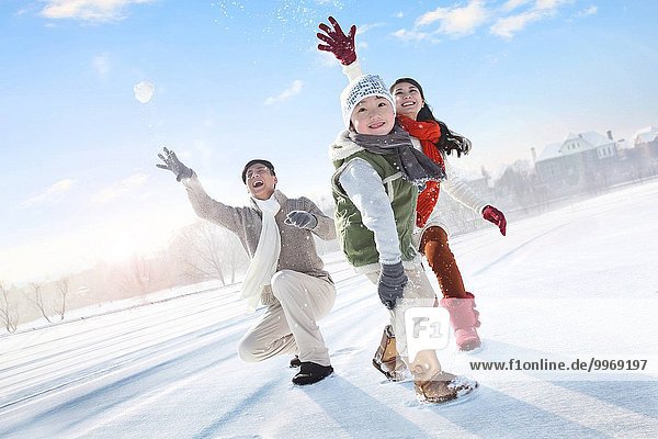 One-child families in the snow snowball fights