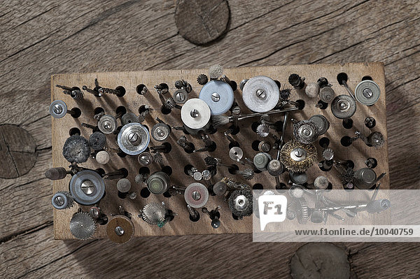 High angle view of assorted drill bits in workshop  Bavaria  Germany