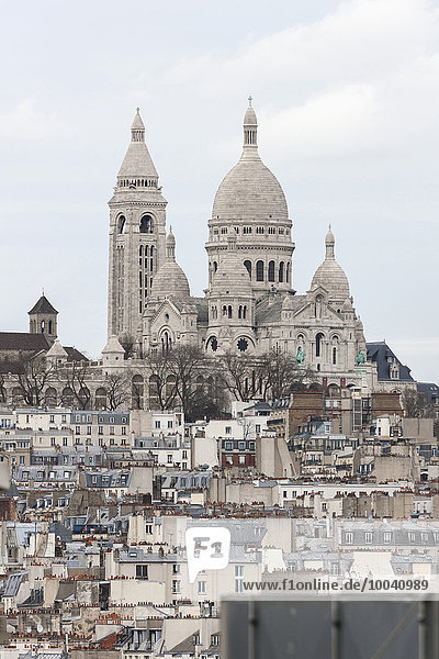 Crowded buildings with Montmartre in the distance,  Sacre Coeur,  Montmatre,  Paris,  France