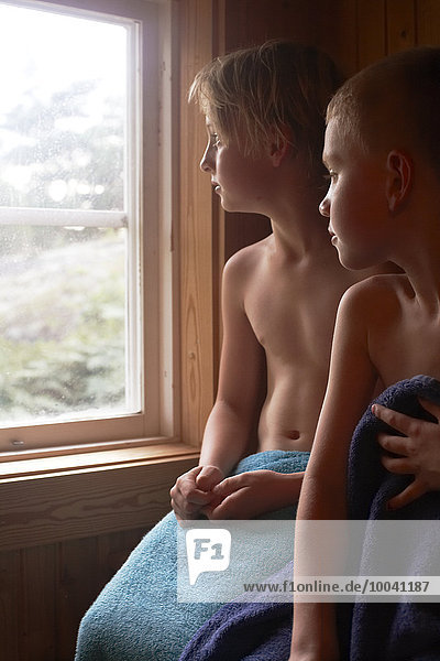 Boys looking through sauna window