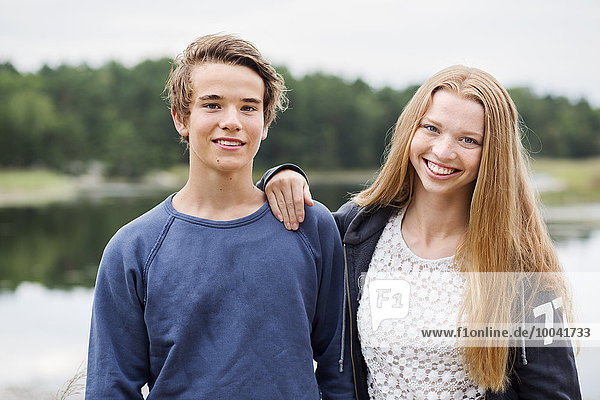 Portrait of smiling teenagers