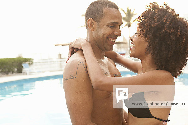 Romantic couple at hotel poolside  Rio De Janeiro  Brazil