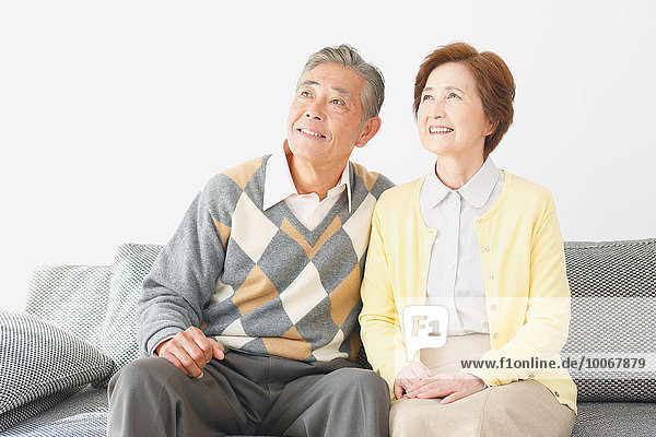Japanese senior couple on the sofa