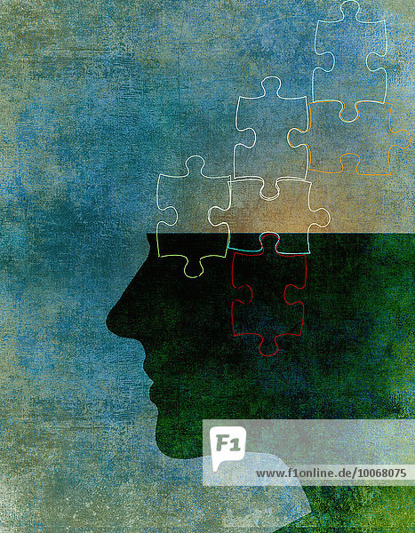 Verbundene Puzzleteile im Kopf eines Mannes