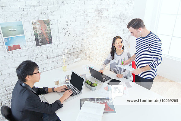 Multi-ethnic business people working in modern office