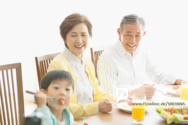 Japanese family together in the kitchen