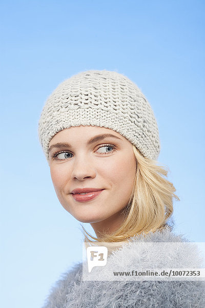 Beautiful woman in knitted hat
