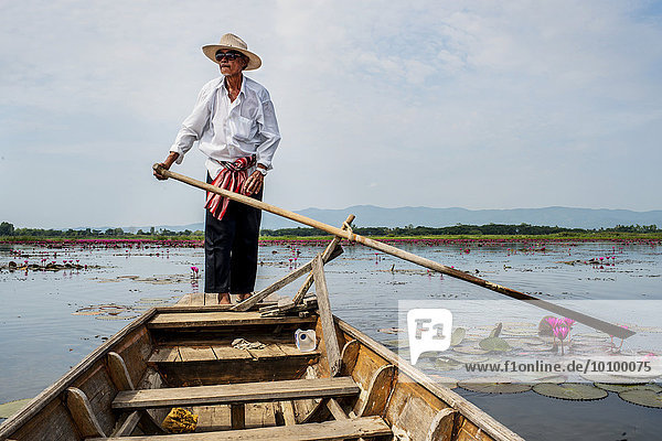 Boatman on the lake  near Phayao  Thailand  Asia