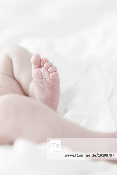 Fuß eines weiblichen Babys