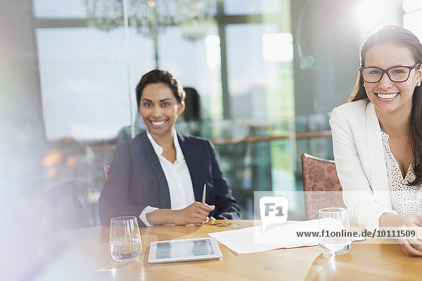 Portrait smiling businesswomen in conference room
