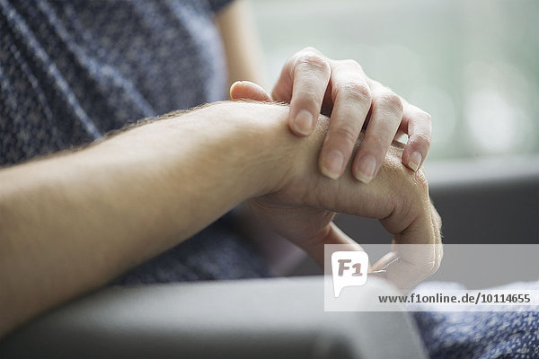 Couple holding hands  close-up
