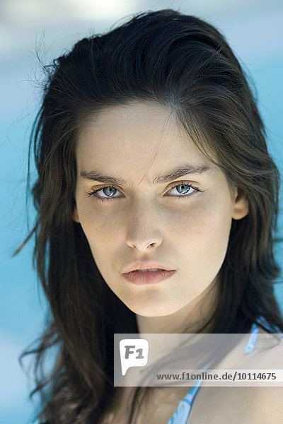 Young woman staring at camera  portrait