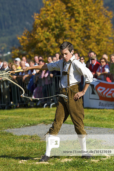 Boy with Lederhosen at a traditional Schnalzer competition in Saalfelden  Pinzgau region  Salzburger Land  Austria  Europe