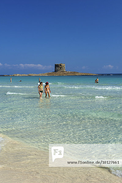 Beach with the Torre della Pelosa tower at back  Sardinia  Italy  Europe