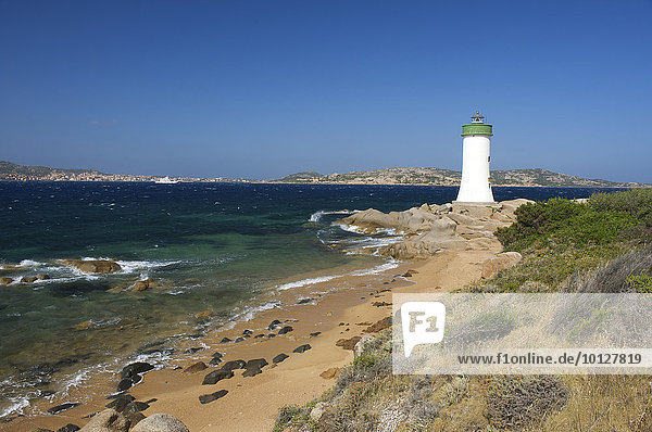 Beach of Porto Faro with the lighthouse at Capo d'Orso  Sardinia  Italy  Europe