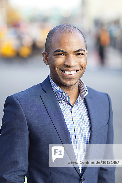 Smiling young man wearing suit